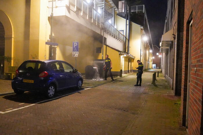 Rookontwikkeling door brand bij ondergrondse container