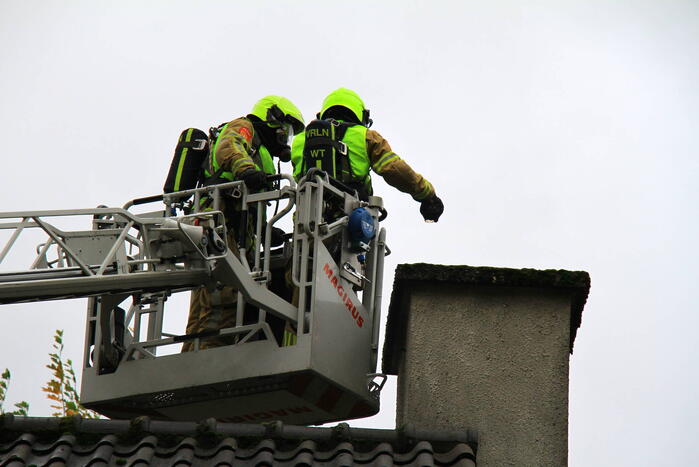 Rookontwikkeling bij brand in schoorsteen