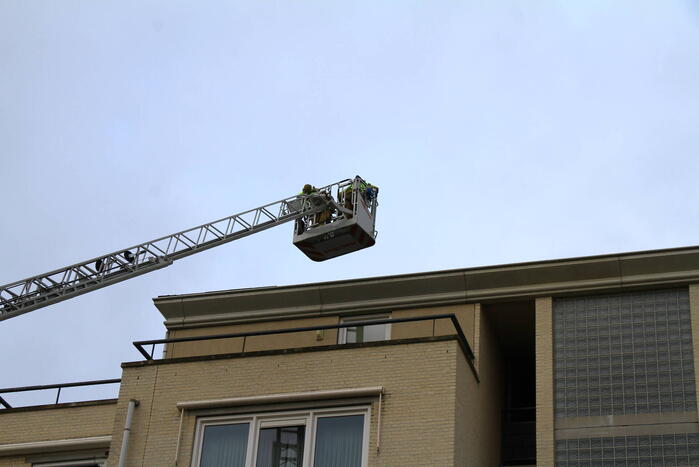 Onderzoek naar mogelijke brand in appartementencomplex
