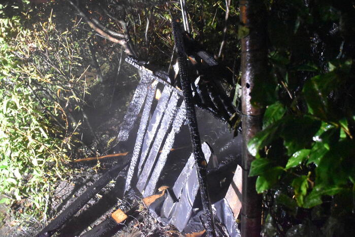 Containerhok verwoest door brand