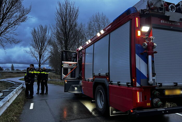 Auto te water inzittenden verlaten plaats ongeval