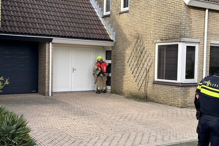 Woning vol rook door brand