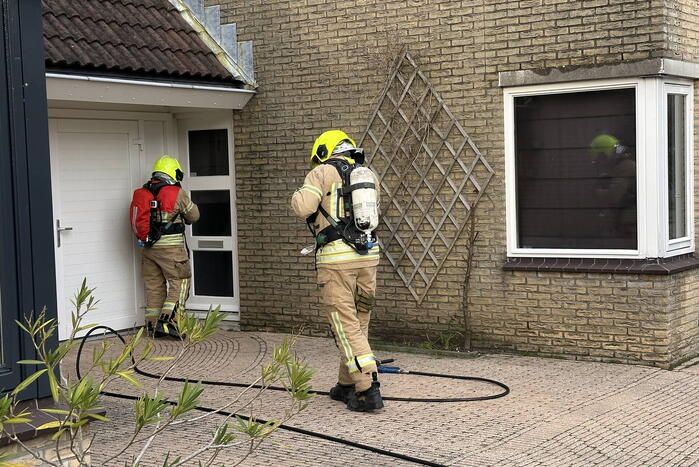 Woning vol rook door brand