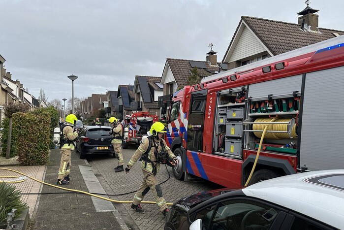 Woning vol rook door brand