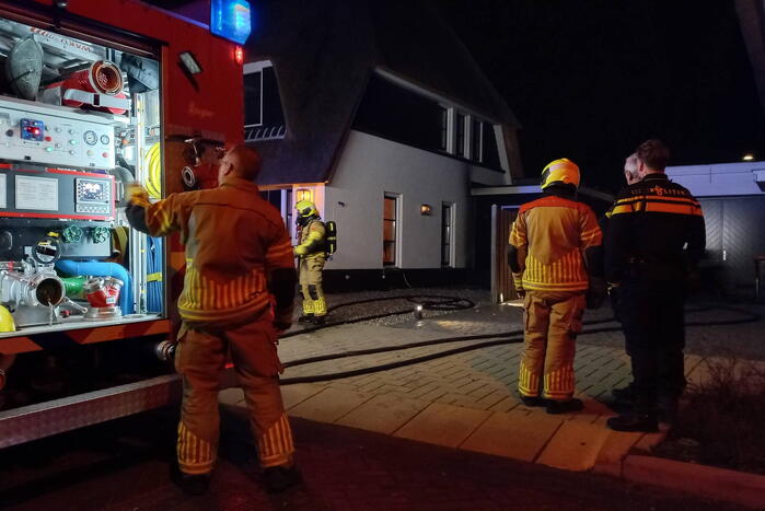 Afvalbrand bij woning