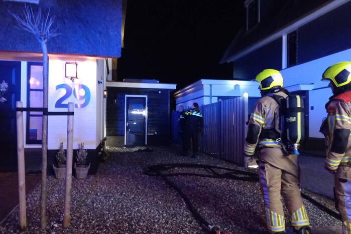 Afvalbrand bij woning