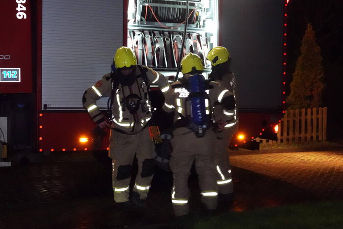 Felle brand in coniferenhaag