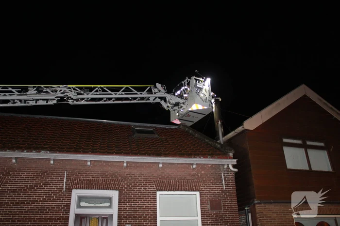 Schoorsteen geveegd na brand