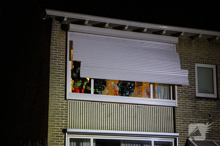 Rolluik van woning los door storm