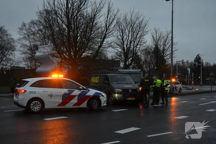 Twee bedrijfsbussen op elkaar geklapt