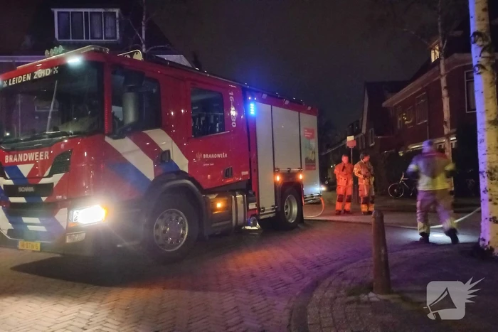 Brand in grote stapel kerstbomen
