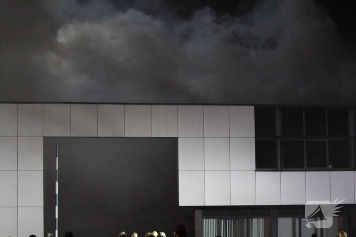 Grote uitslaande brand in bedrijfspand