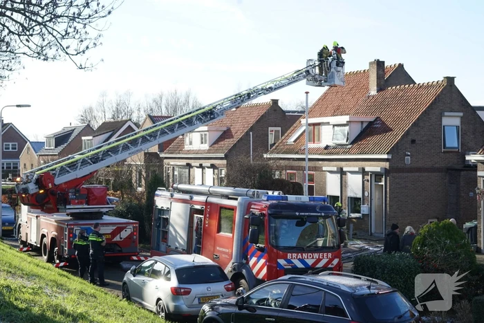 Veel rook door schoorsteenbrand