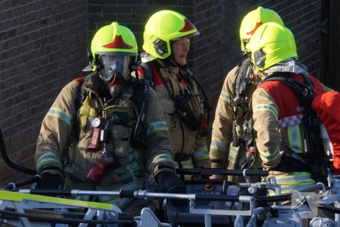 Veel rook door schoorsteenbrand