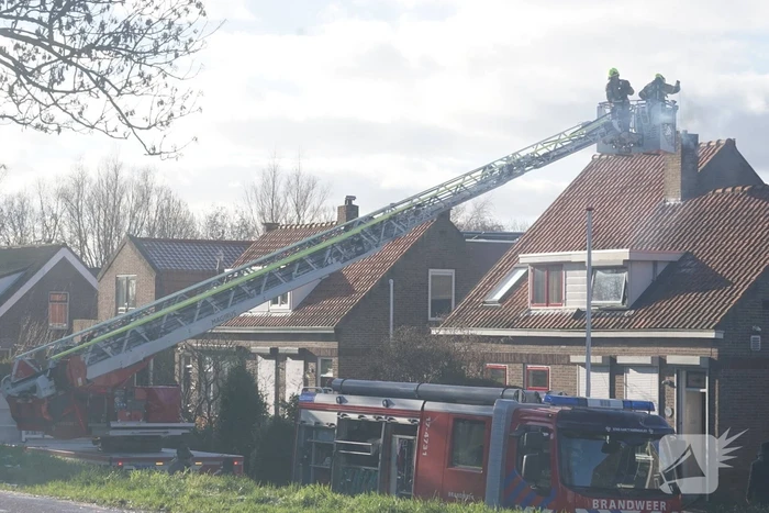 Veel rook door schoorsteenbrand