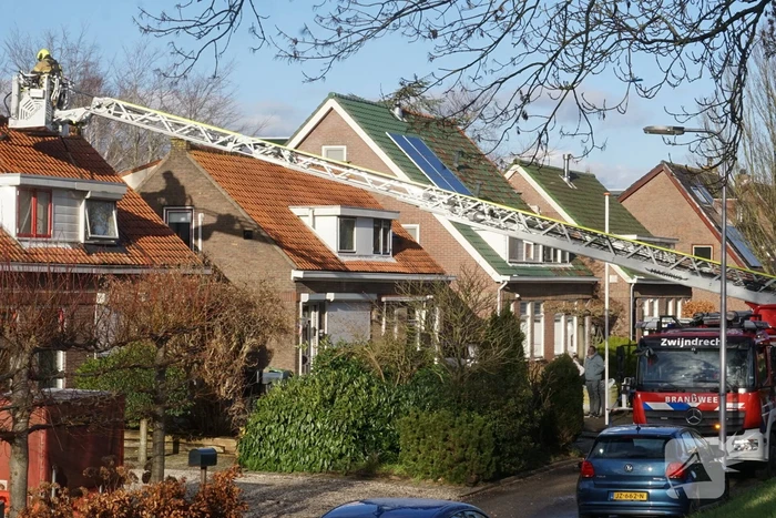 Veel rook door schoorsteenbrand