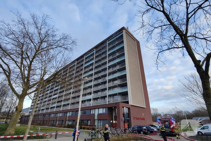 Brandstichting in trappenhuis van flat