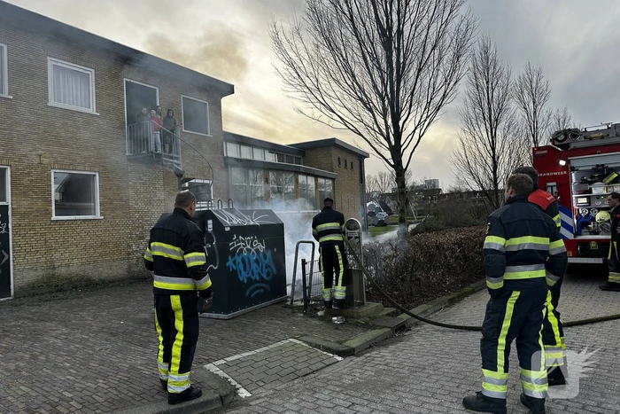 Textielcontainer vat vlam