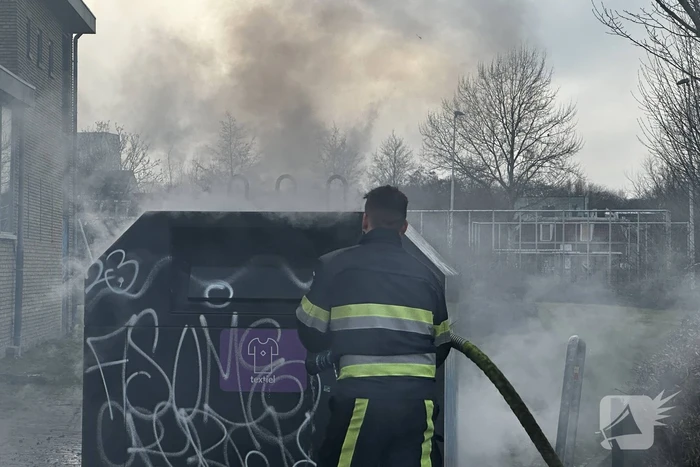 Textielcontainer vat vlam