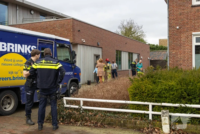 Geldloper vast in deur