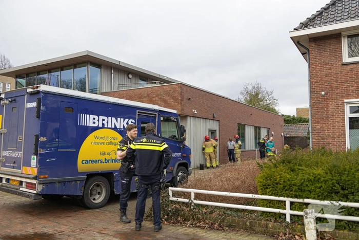 Geldloper vast in deur