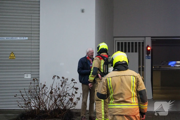Rookontwikkeling in garage van flat
