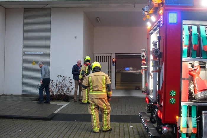 Rookontwikkeling in garage van flat