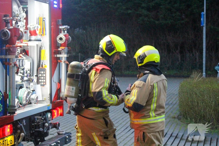 Rookontwikkeling in garage van flat