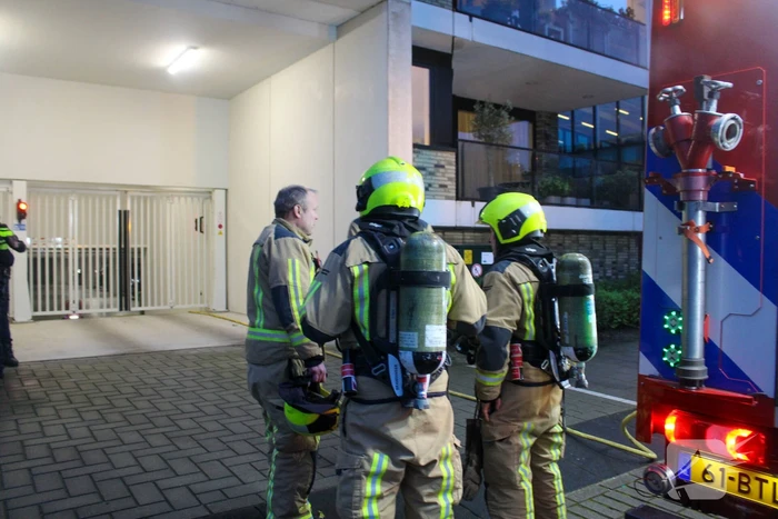 Rookontwikkeling in garage van flat