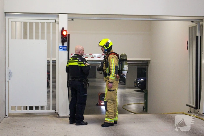 Rookontwikkeling in garage van flat