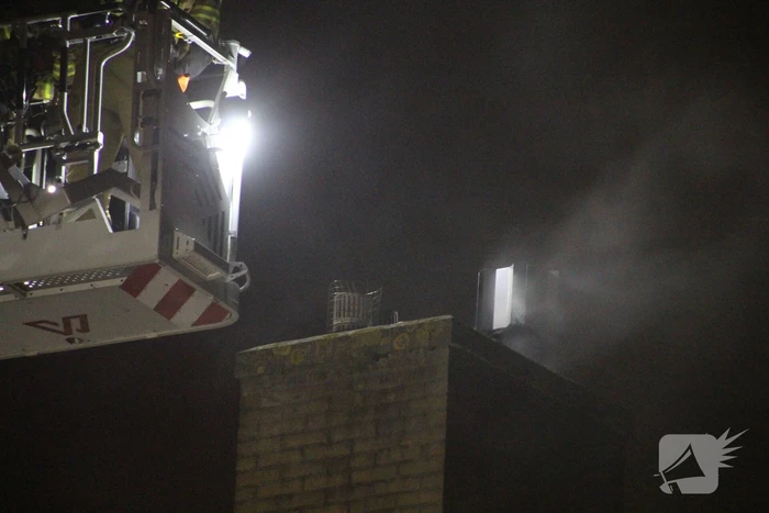 Flinke rookontwikkeling bij brand in schoorsteen