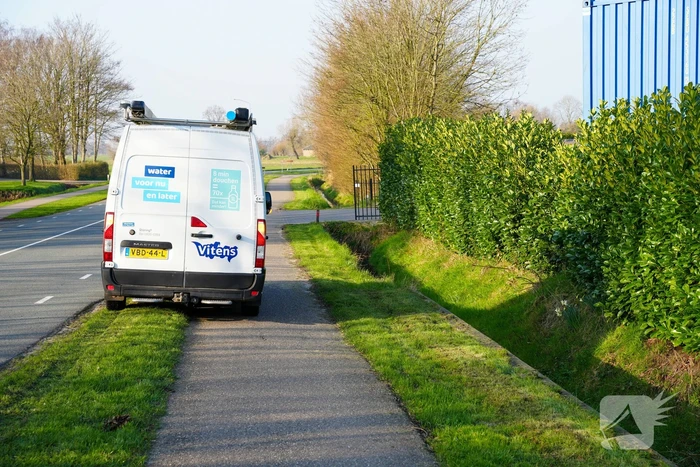 Waterlekkage langs fietspad