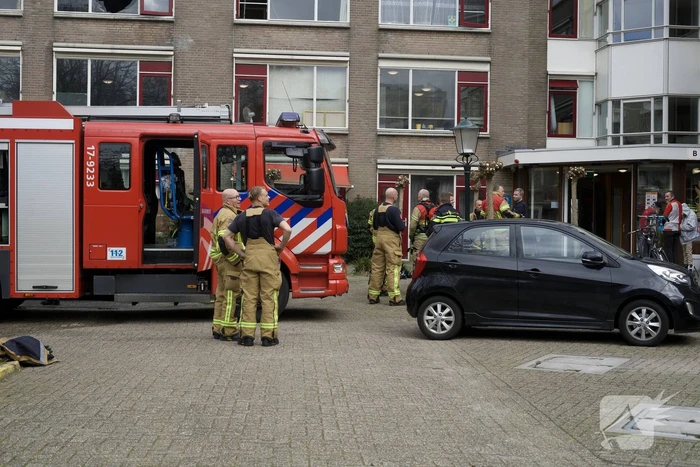 Bewoner uit brandend huis gehaald, veel schade