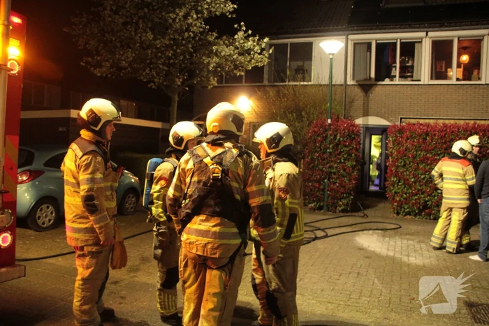 Schoorsteen geveegd na brand