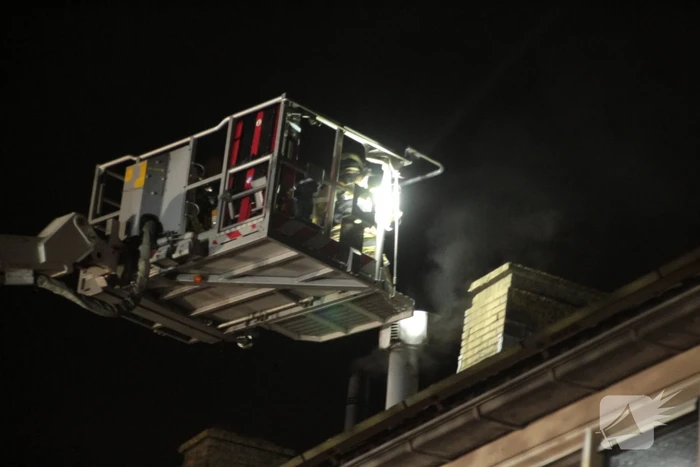 Schoorsteen geveegd na brand