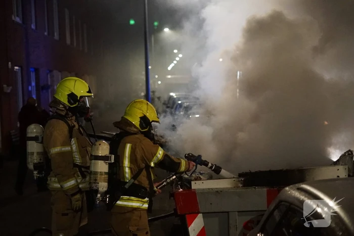 Brand in container met bouwafval