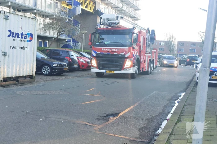Rookoverlast door barbecue op balkon