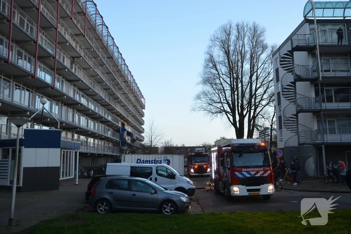 Rookoverlast door barbecue op balkon