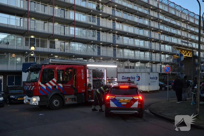Rookoverlast door barbecue op balkon