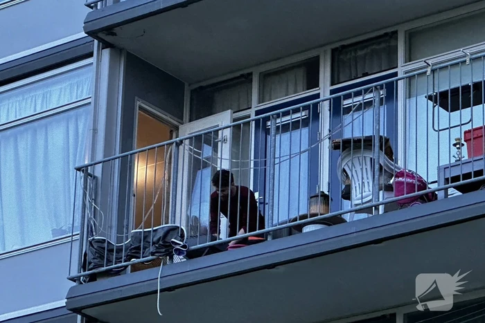Rookoverlast door barbecue op balkon