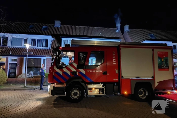 Brand in schoorsteen van woning