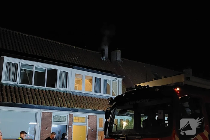 Brand in schoorsteen van woning