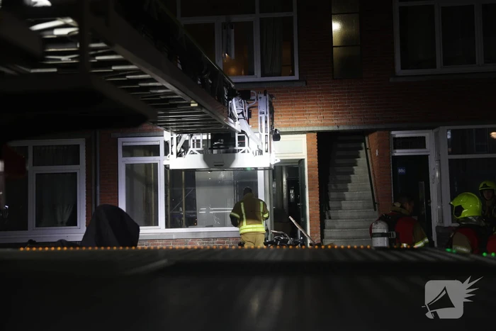 Brand in portiekwoning snel geblust