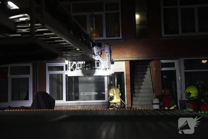Brand in portiekwoning snel geblust