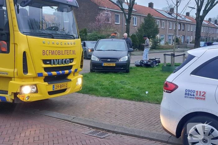 Twee personenauto's met elkaar in botsing