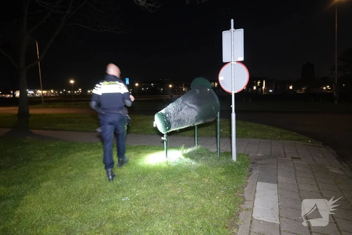 Politie blust brand in afvalvangnet