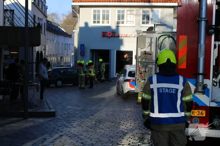 Auto ramt gevel Aziatisch restaurant