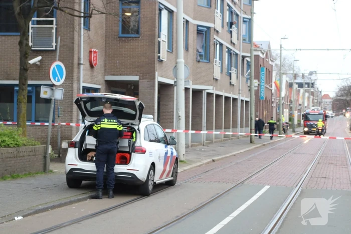 Stoel in woning vliegt in brand