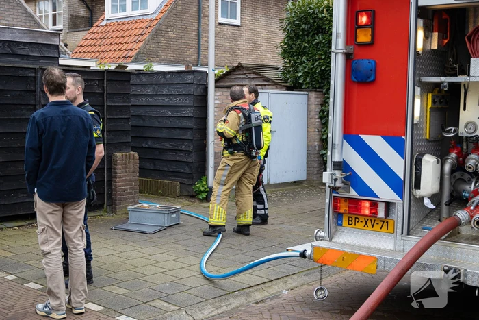Rook bij brand in kelder van woning