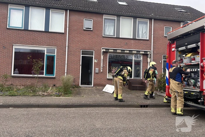 Rookontwikkeling bij brand in keuken van woning